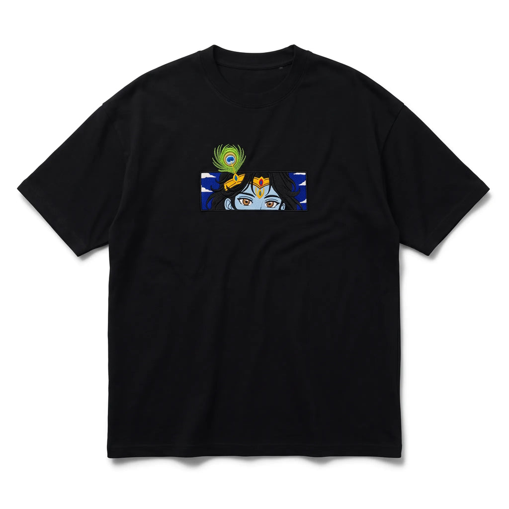Rei Sutra black heavyweight cotton t-shirt featuring an embroidered graphic of Lord Krishna eyes and peacock feather.